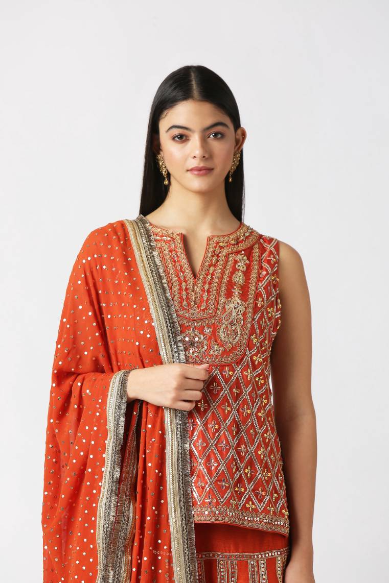 Orangeade Short Kurta And Panelled Sharara Set